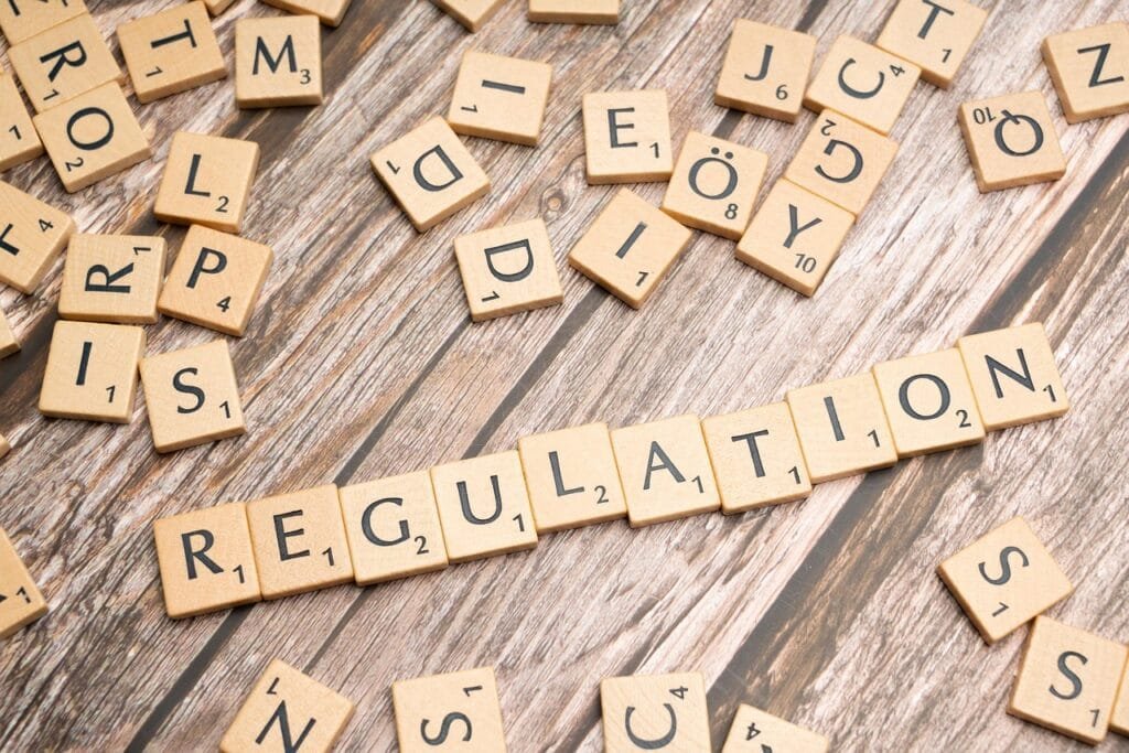 regulation, regulatory framework, compliance with regulations, regulatory standards, regulatory authorities, government regulation, industry regulation, financial regulation, regulatory policy, regulatory reforms, regulatory oversight, regulatory requirements, regulatory guidelines, regulatory reporting, regulatory enforcement, regulatory changes, regulatory implications, tile, word, letter tiles, background